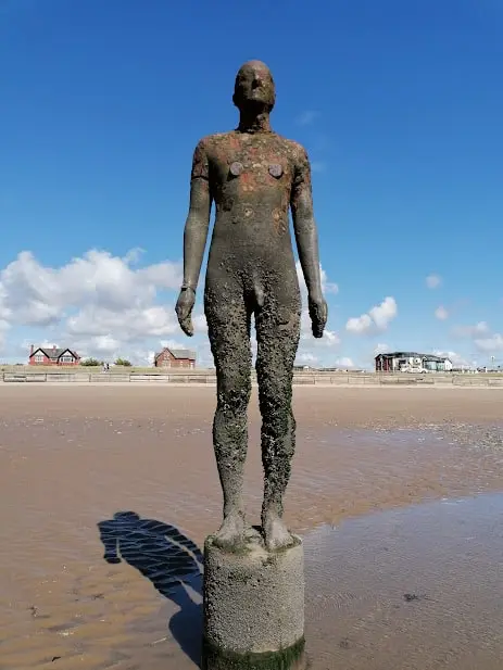 One Of The Iron Men Standing On Crosby Beach